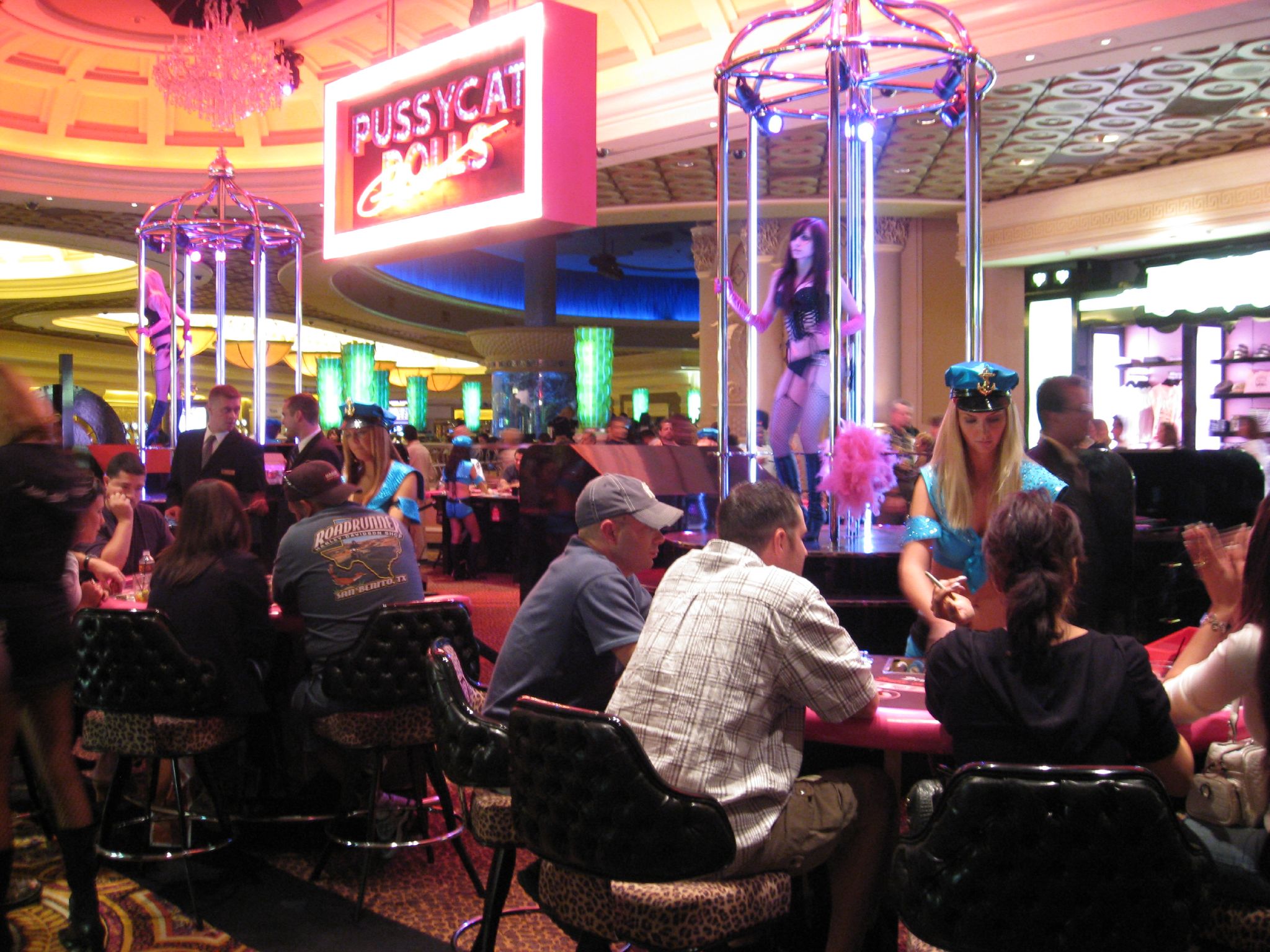 Men and Women Playing Pai Gow Poker at the Pussycat Dolls Casino located at the Caesars Palace in Las Vegas